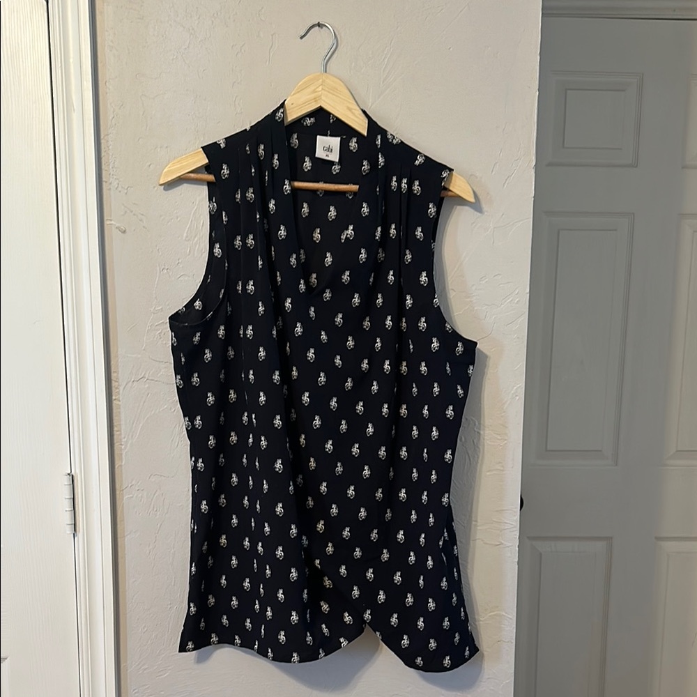CAbi Black and White Asymmetrical Sleeveless Blouse